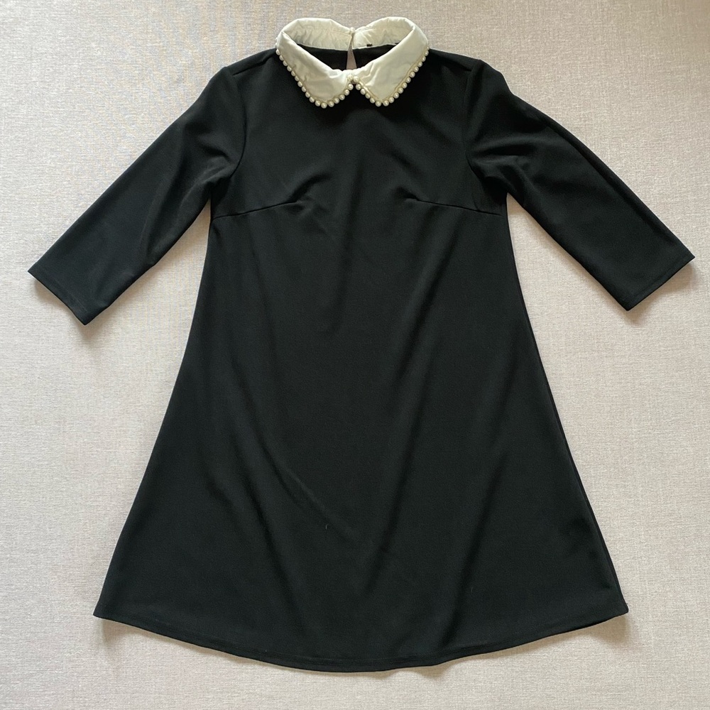 Black pearl mini babydoll dress.